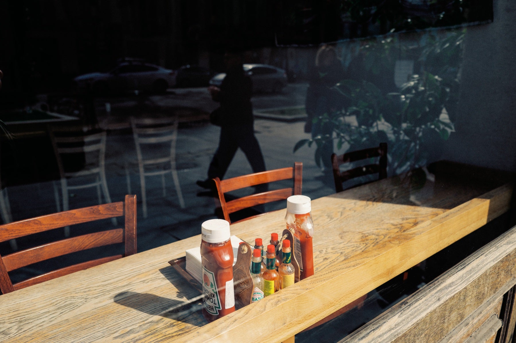 Café window in Tbilisi, edited with the Vision 3 250D profile at 0 EV, Professional base